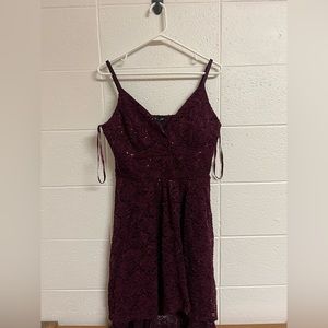 New homecoming dress, high in back to lower in front.